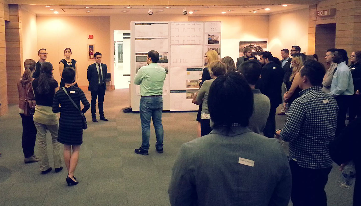 Ricardo Munoz, Page Senior Associate and University of Texas at Arlington CAPPA adjunct professor, is the third person from the left facing the audience at the first professional mixer. - Miguel Mendez