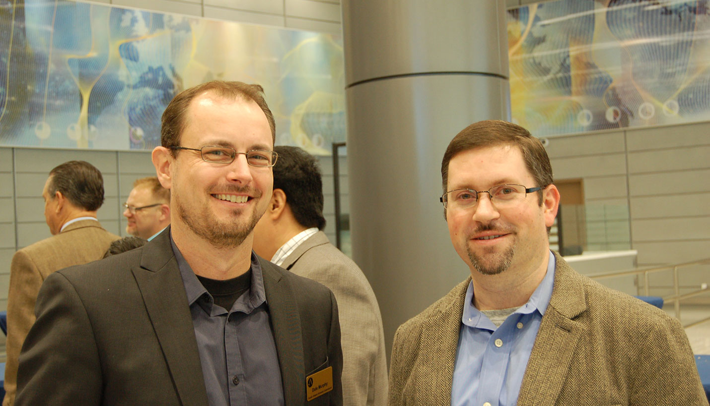 Page Project Architect, Paul Bielamowicz (right), with Dale Murphy, City of Austin Airport Advisory Commission - Talmadge Smith