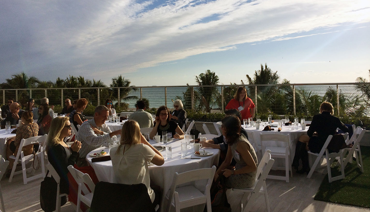 Breakfast networking on The Edition’s rooftop. - 