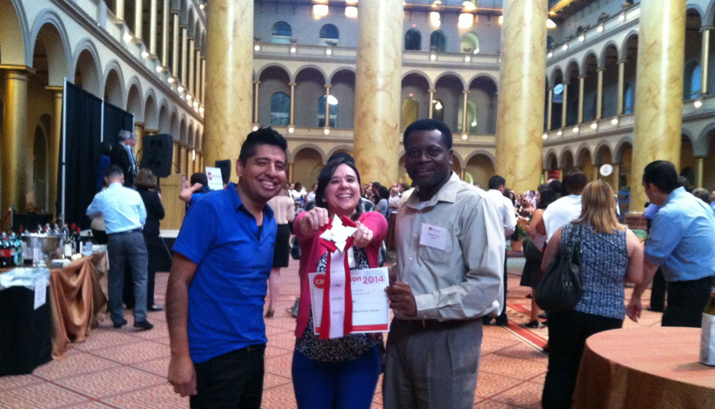 Ana Garcia Balboa (center) celebrates with Saul Zapata (L) and Floyd Stoutt (R). - 