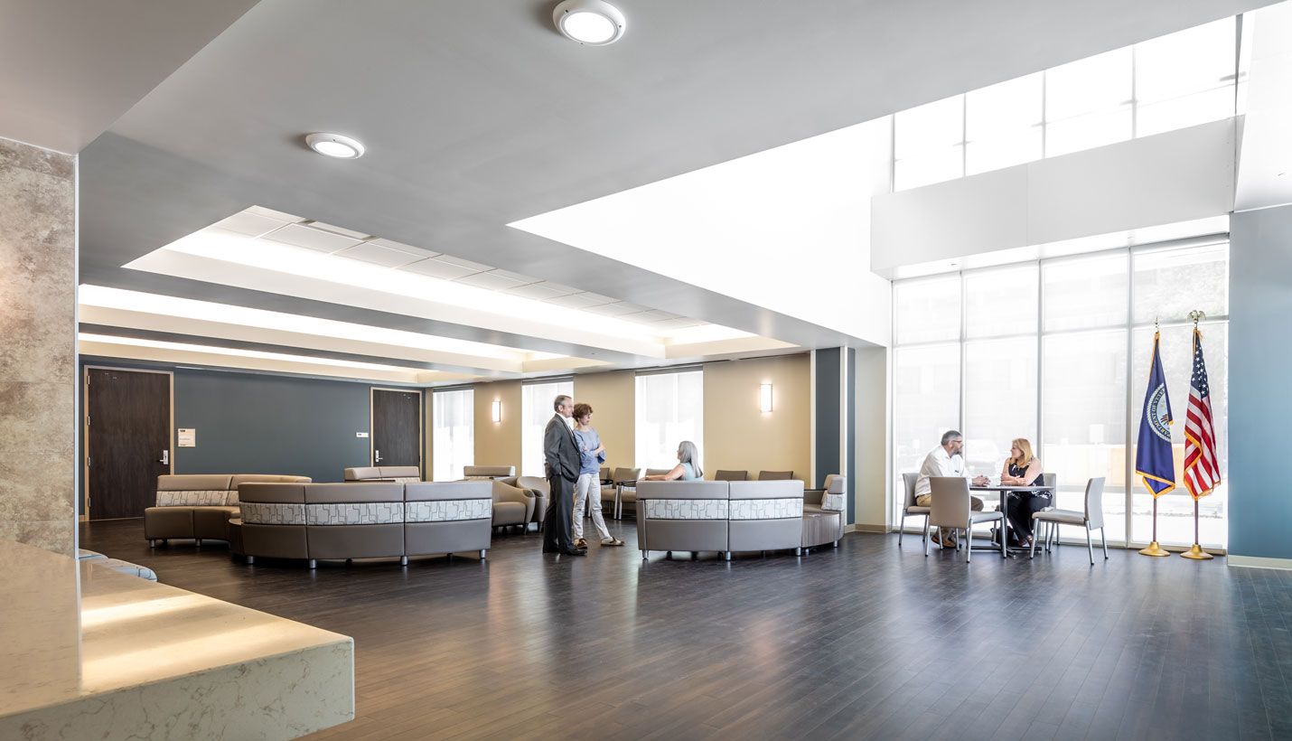 Lower and higher ceiling heights are purposefully positioned to encourage comfort for all patients. - 