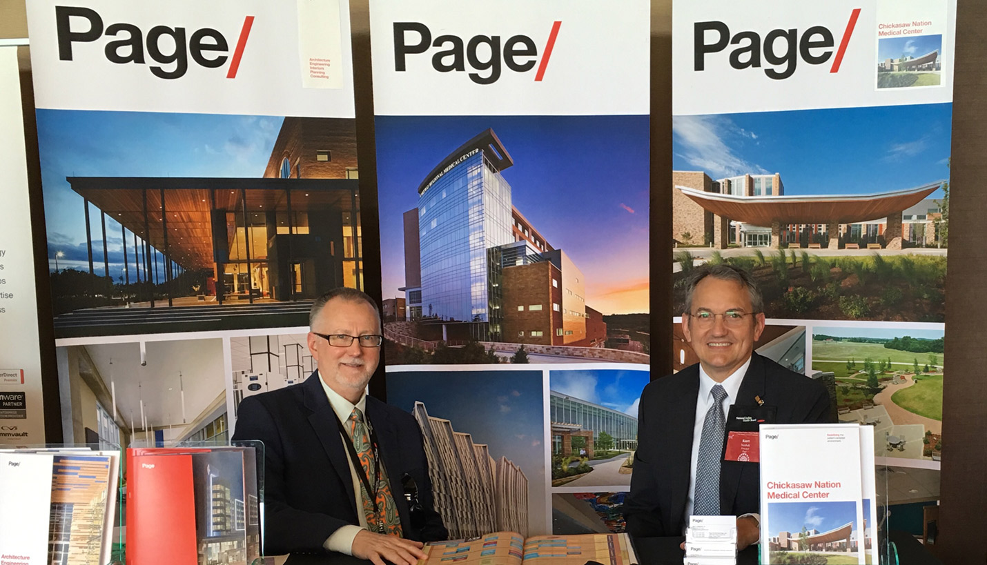 Left, Dan Killebrew, AIA and right, Kurt Neubek, FAIA, at the National Tribal Nations Annual Health Conference. Not pictured: Kregg Elsass. - Page