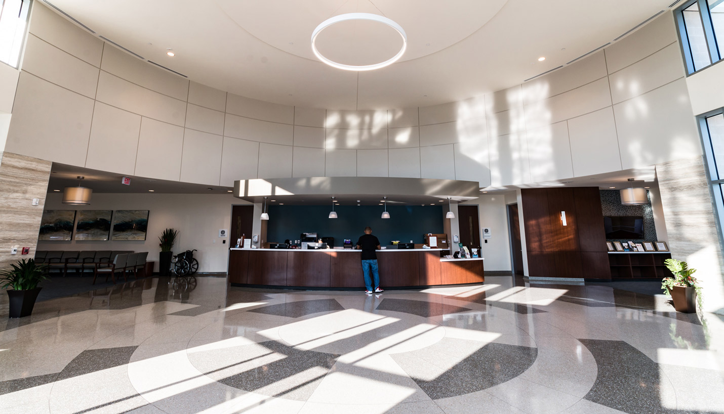 The lobby of the newly-opened Kelsey-Seybold multispecialty healthcare center in Sienna Plantation during celebratory remarks. - Kelsey-Seybold