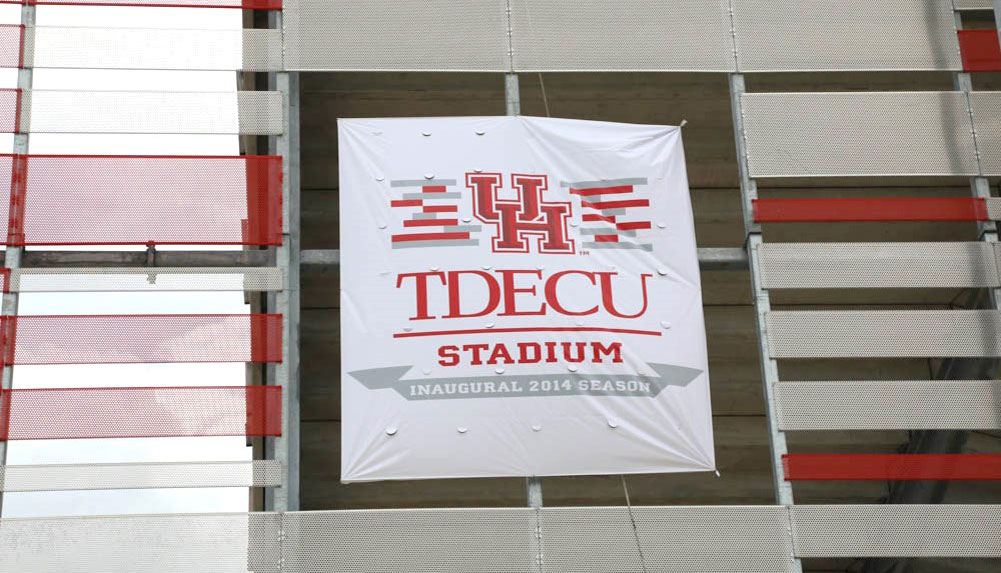 New Name, New Game: Banner showing new UH TDECU Stadium name at press conference announcement. (07/09/2014) - University of Houston