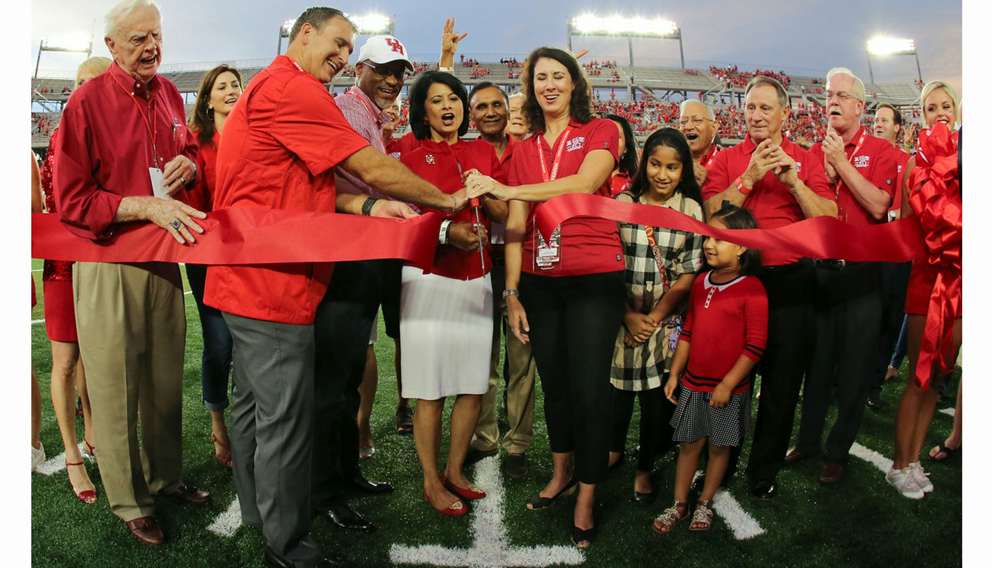 Completion of a Stadium Design: University of Houston Athletics Director Mack Rhoades, Chancellor Dr. Renou Khatour and regents cut the opening ribbon. (09/05/2014) - Stephen Pinchback