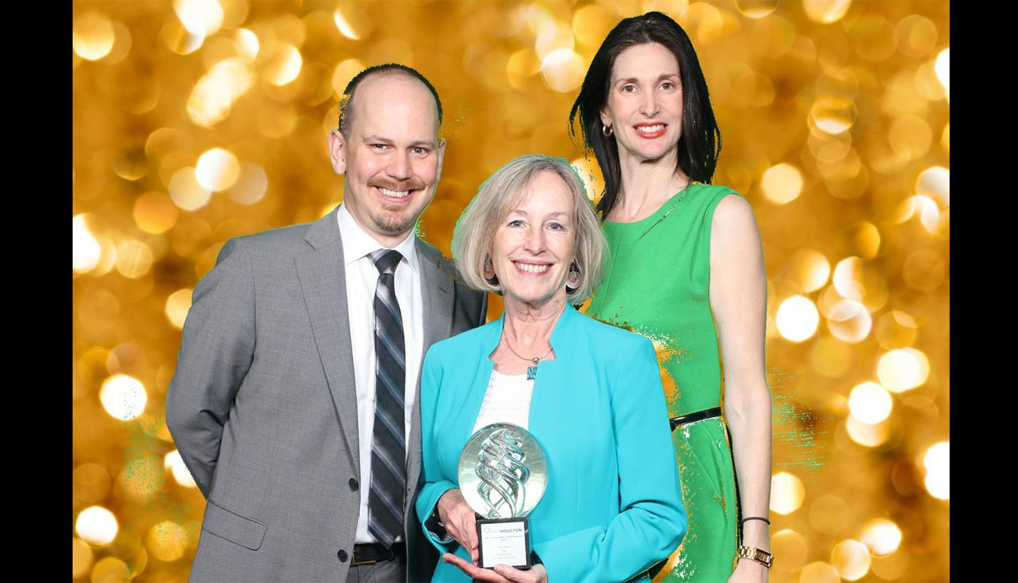 (L-R) John Clegg, Page Design Principal; Nancy Acker Fleshman, Communications Director and Karyn Guerrero, Brand Management Director, accept the Best Brand/Rebrand award from the American Marketing Association. - CTM PhotoPlus